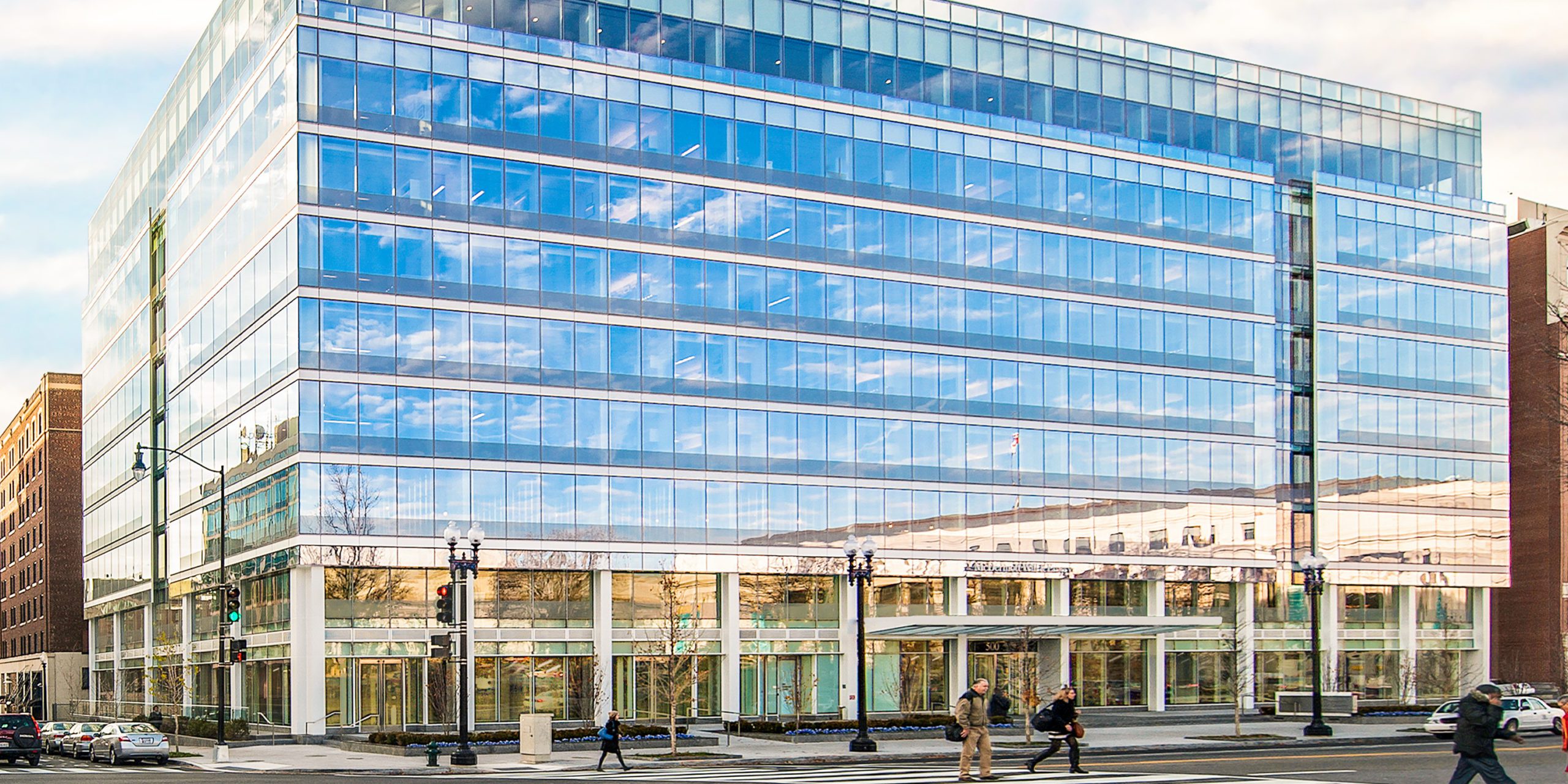 Bustling street view of 500 North Capital on a winter morning.