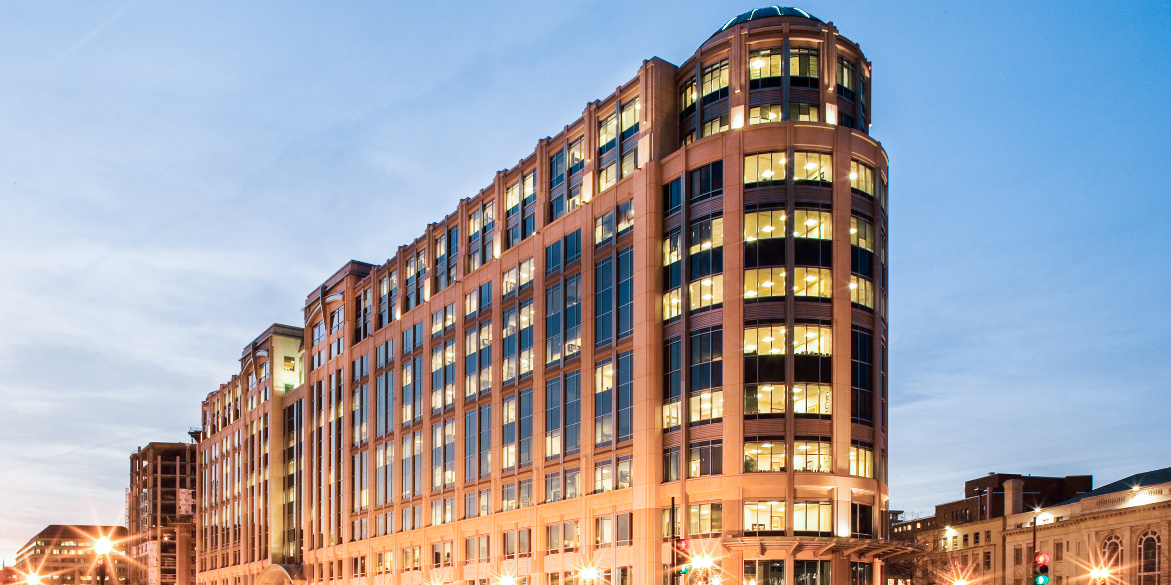 901 New York Avenue lit up at dusk