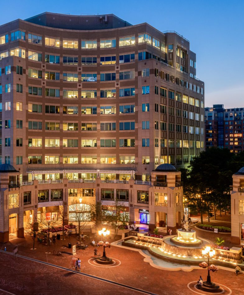 Fountain Square courtyard lit up at in the evening