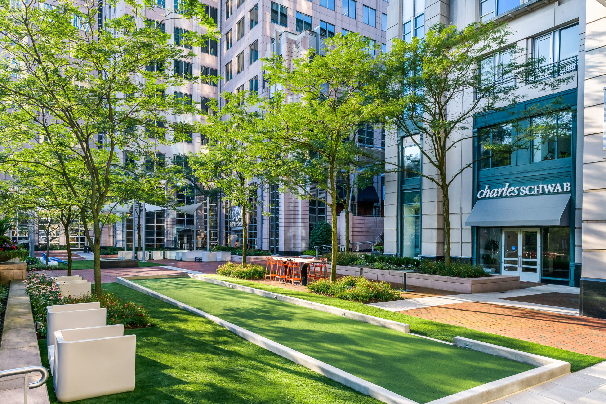 Greenspace at Freedom Square during the day.