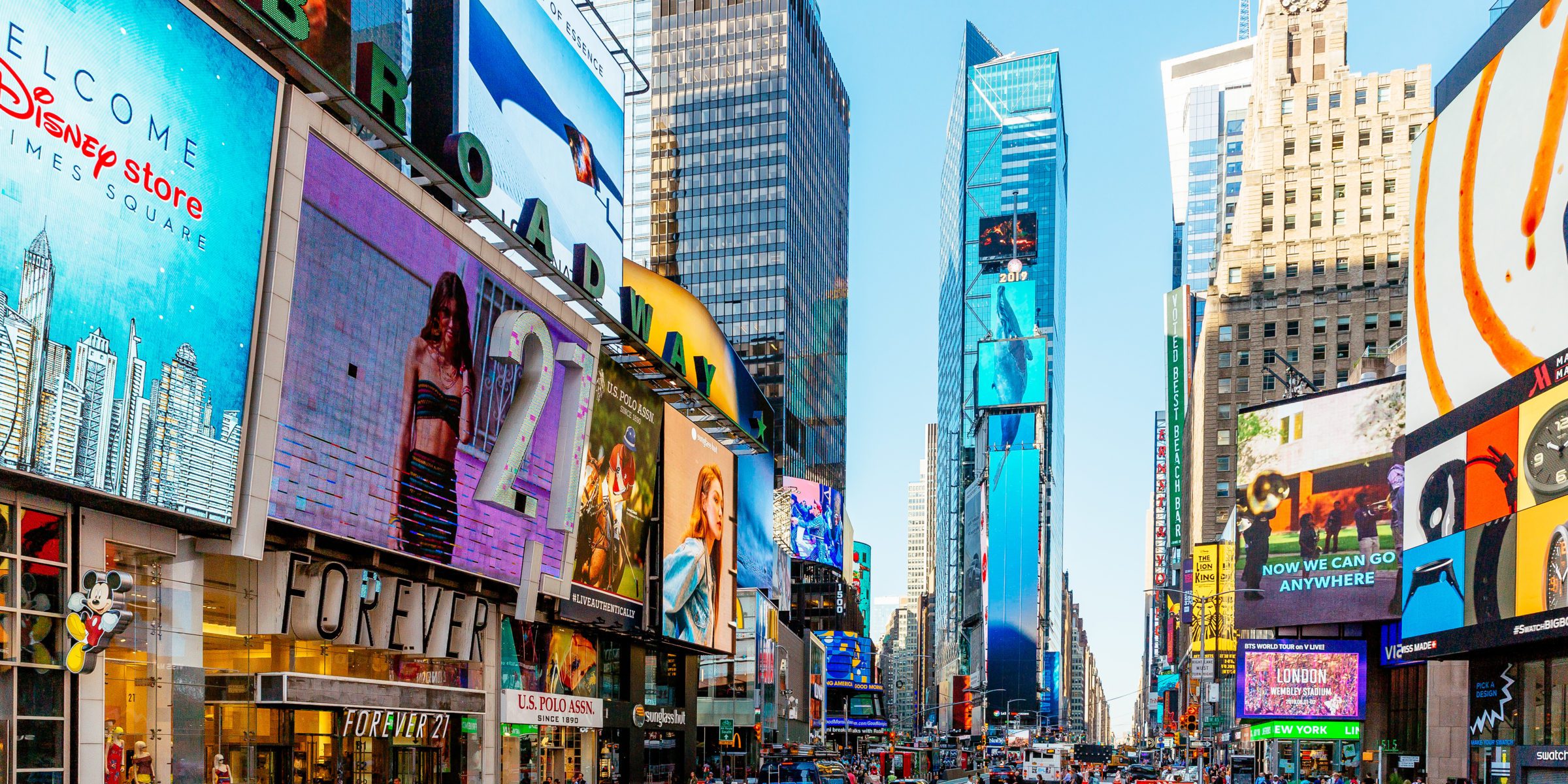 Crowded Times Square on a sunny morning, New York City