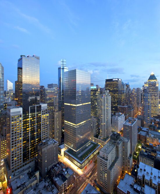 Reflection of sunset in 250 West 55th Street windows.